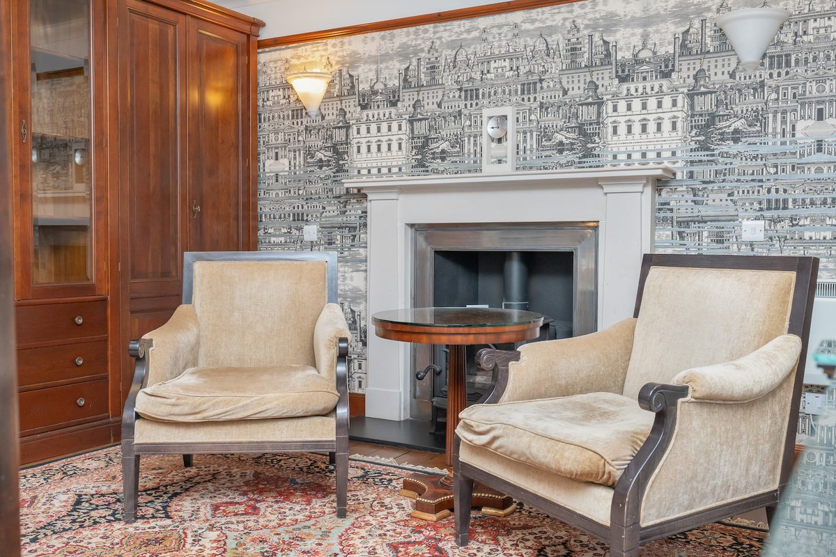 Drawing room with open fire at The Polchar